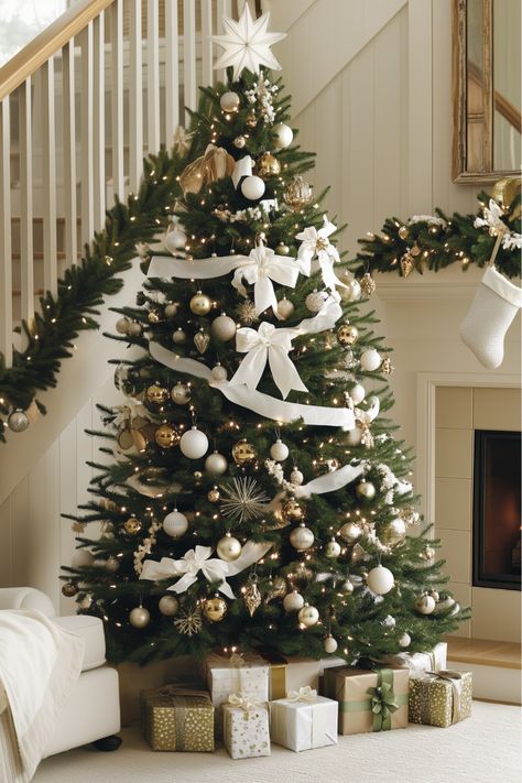 If you love that touch of luxury, a white Christmas tree with gold accents might be your perfect match. Imagine the soft glow of gold against clean white tones—it’s pure elegance! How would a glamorous white and gold tree look in your home this season? Add a bit of sparkle and warmth for a truly festive holiday vibe. Gold And White Xmas Tree, Green Christmas Tree Decorations Ideas, White And Green Christmas Tree Ideas, White And Gold Tree Christmas, White Green Gold Christmas Decor, Christmas Tree Ideas Gold And White, Christmas Tree Ideas White And Gold, White Christmas Tree Color Schemes, White Silver And Gold Christmas Tree