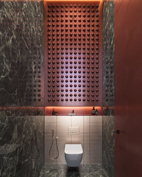 This elegant bathroom design in Riyadh blends luxurious materials and contemporary aesthetics. The dark green marble, used extensively on the walls and floors, adds a touch of sophistication and opulence 💎, while the organic-shaped mirrors paired with ambient lighting create a modern, artistic vibe 🎨. The copper accents on the faucets and fixtures add warmth and a refined contrast to the cool-toned marble, making the space feel inviting and chic 🌟. The statement wall behind the toilet, ad... Dark Green Marble, Elegant Bathroom Design, Artistic Vibe, Copper Accents, Statement Wall, Elegant Bathroom, Green Marble, Riyadh, Organic Shapes