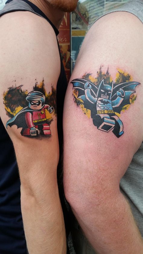 Lego Batman and Robin tattoos Lego Batman Tattoo Ideas, Batfamily Tattoo, Batman Leg Tattoo, Batman Robin Tattoo, Batman And Robin Tattoo, Lego Batman Tattoo, Lego Tattoo Ideas, Batman Joker Tattoo, Batman And Robin Movie