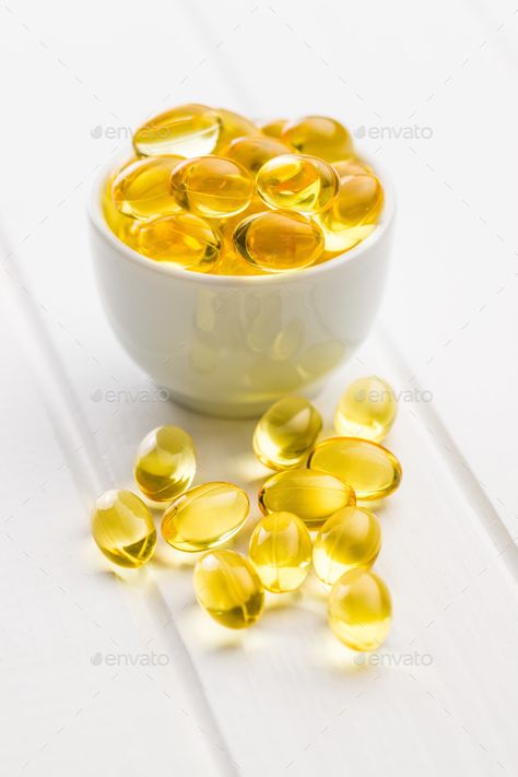 Omega 3 gel capsules by jirkaejc. Omega 3 gel capsules on white table. #AD #capsules, #gel, #Omega, #table Gel Capsules, Granola Breakfast, Roasted Peanuts, Raspberry Jam, White Table, Omega 3, Granola, Abstract Design, Raspberry