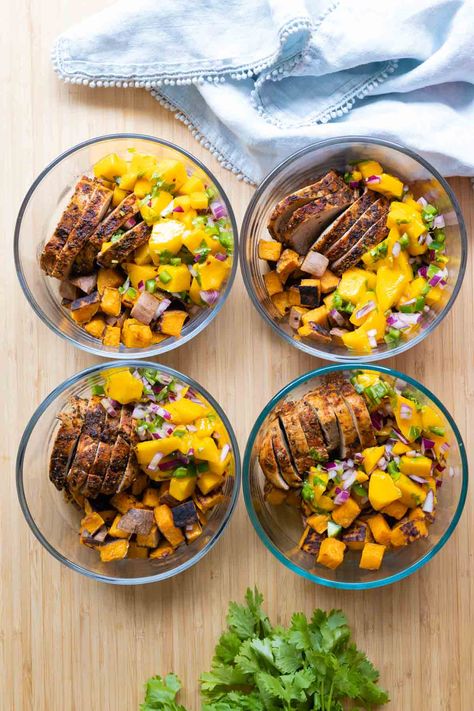 Sweet and savory Pork Mango Meal Prep Bowls that burst with flavor. Juicy pork tenderloin, tender sweet potatoes, and a delicious mango salsa. Pork Tenderloin Bowl, Pork Tenderloin Meal Prep, Juicy Pork Tenderloin, Clean Meal Prep, Healthy Lunches For Work, Prep Bowls, Meal Prep Clean Eating, Lunch Bowl, Tenderloin Recipes