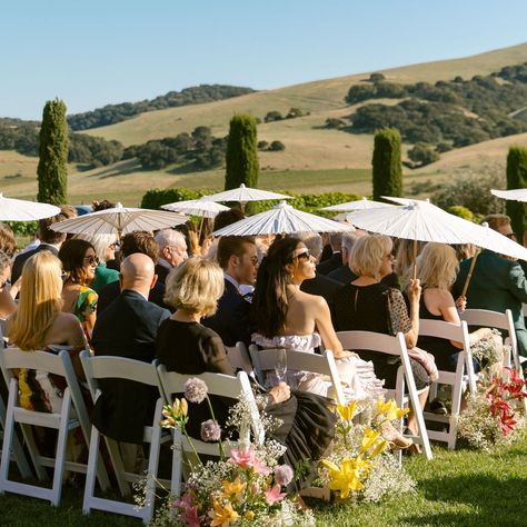 Ceremony parasols are one of our 2024 summer wedding must-haves! What are yours?  Site: @viansasonoma Photographer: @jemerlingweddings Florals: @maiden.flora  #summerwedding #parasol #weddingcatering  #parasol Umbrella Wedding Ceremony, White Umbrellas Wedding Ceremony, Wedding Guest Umbrellas, Wedding With Parasols, Parasol Aesthetic, Wedding Parasols Ceremony, Parasol Wedding Ceremony, Bridesmaids With Parasols, Sun Umbrella Wedding