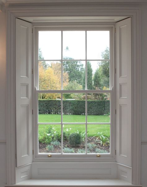 Traditional sliding sash window with handmade shutters. Georgian Window Shutters Indoor, Farmhouse Sash Windows, Georgian Sash Windows, Sliding Sash Windows, Window With Shutters, Slide Up Window, Window Panelling, Sash Window Shutters, Windows With Shutters