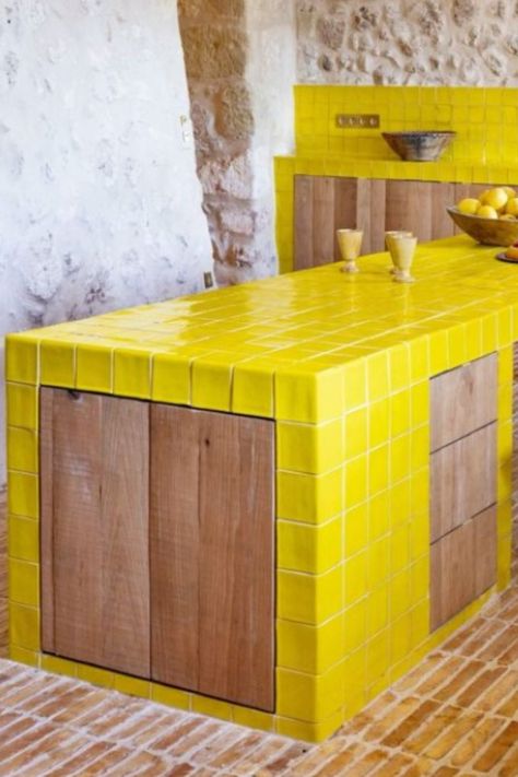 Acid Yellow glazed field tiles and special tiles featured in french kitchen island and kitchen backsplash. #newterracotta #glazedtiles #kitchendesign #yellow Random Tile Backsplash, Yellow Tiled Kitchen, Tiled Kitchen Island, Kitchen Island Tile, Yellow Tile Kitchen, Tile Kitchen Island, French Kitchen Island, Terracotta Kitchen Tiles, Mallorca House