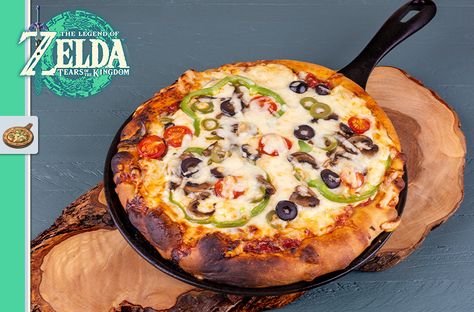 The Legend of Zelda: Tears of the Kingdom - Hylian Tomato Pizza - Pixelated Provisions Zelda Tears Of The Kingdom Recipes, Video Game Food Recipes, Legend Of Zelda Recipes, Video Game Recipes, Legend Of Zelda Food Recipes, Legend Of Zelda Breath Of The Wild Recipes, Legend Of Zelda Food, Botw Food, Zelda Breath Of The Wild Food