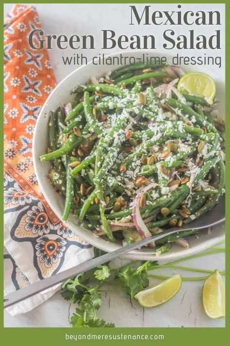 It's summer, and the same old green salad doesn't sound appealing? Try this Mexican Green Bean Salad with fresh tender crisp green beans, red onion, and cotija, dressed up with a simple cilantro lime dressing and toasted pepitas. It's a perfect side with a definite Latin vibe! #Mexicangreenbeans #greenbeansaladrecipe #healthyMexican #Mexicansides #quickhealthysides #glutenfreesides #vegetariansides Mexican Green Beans Recipe, Mexican Green Beans, Green Beans Side, Green Bean Salad Recipes, Green Beans Side Dish, Green Bean Salad, Cilantro Lime Dressing, Green Bean Salads, Quick Dishes