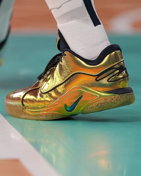 @teamusa secured gold in basketball at @paris2024 , with @kingjames donning a striking pair of gold @nike LeBron 22s for the final. The shoes, featuring shimmering gold with black detailing and signature Swoosh outlines, were a standout as millions watched the historic win. This may be LeBron’s final appearance as a USA Basketball player, and while this specific design is likely a PE, stay tuned for potential updates or releases to honor King James and Team USA’s triumph. Dripping or Trippin... Nike Shoes Basketball, Basketball Lebron James, Gold Nike, Lebron Shoes, Usa Basketball, Nike Gold, Nike Basketball Shoes, Basketball Player, Nike Lebron