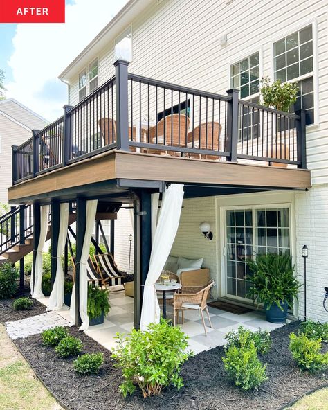 Curtains around the ground-level patio can be closed to provide additional sun protection or privacy. Credit: Trex Company Backyard Under Deck Patio Ideas, High Decks Backyard, Deck With Patio Underneath, 2nd Floor Deck Ideas, Sunroom Backyard, Second Floor Deck Ideas, Under Deck Patio Ideas, Under Deck Ideas, Townhouse Patio