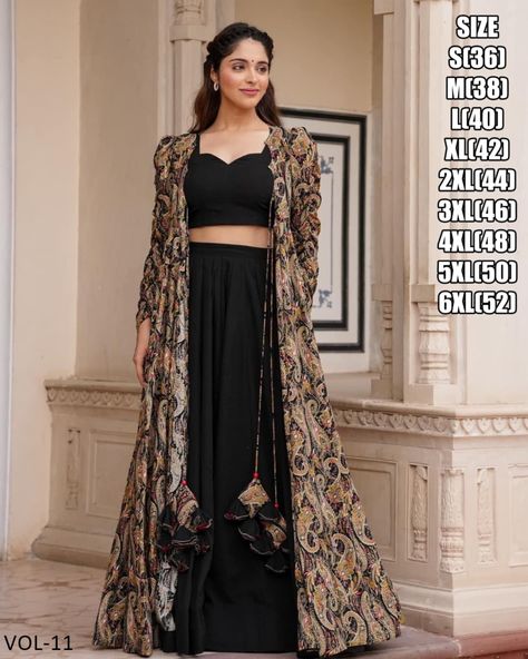 Introducing our breathtaking 3-piece Koti style Indo-western suit! This stunning collection features a printed crop top, elegant skirt or palazzo, and chic parallels, all beautifully complemented by a stylish printed shrug. Elevate your wardrobe with this must-have ensemble! #weareffortlessly #Indowestern #Fashion #Style #Trendy #Chic #OOTD #InstaFashion #Luxury . ▪️Fabric Detail Shrug Fabric: Pure Rayon Blouse/Skirt Fabric : Faux Georgette . Pattern: Digital Print . Top Length: - 14-15” Skir... Shrug Dresses Indian, Crop Top With Plazo And Jacket, Indo Western Outfits Casual, Black Indo Western Dress, Georgette Crop Top, Long Shrug, Traditional Skirts, Haldi Outfits, Desi Dress