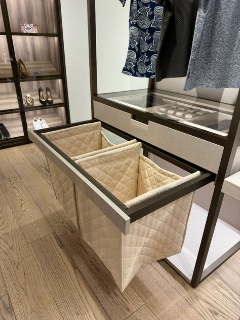 A tailor-made laundry pull-out is typically designed as a discreet compartment within a closet or wardrobe system. Utilizing vertical space within a closet and maximizing the use of available square footage, makes this option ideal for homes with limited room or for those who prefer to keep laundry facilities hidden away.⁠ ⁠ Store Hangers, Gear Closet, Luxury Laundry, Custom Laundry Room, Cloth Hanger, Wardrobe Systems, Messy Crafts, Clean Clothes, Curated Closet