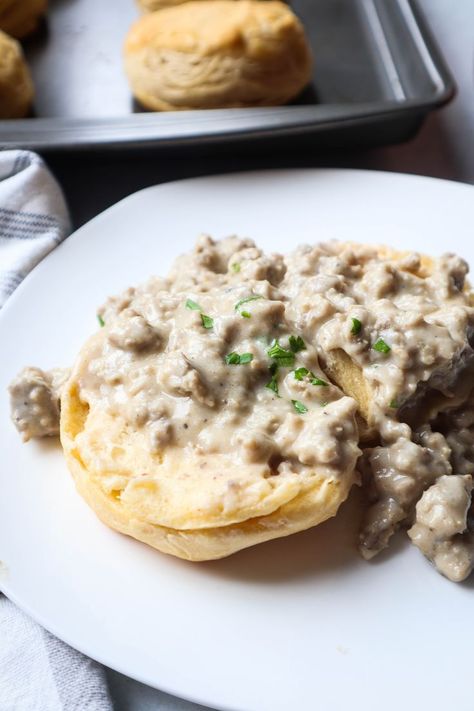 white plate with flaky biscuits topped with turkey sausage gravy and garnished with parsley Ground Turkey Gravy, Best Ever Turkey, Southern Biscuits And Gravy, Gravy And Biscuits, Ground Turkey Sausage, Turkey Breakfast Sausage, Turkey Gravy Recipe, Homemade Buttermilk Biscuits, Turkey Breakfast