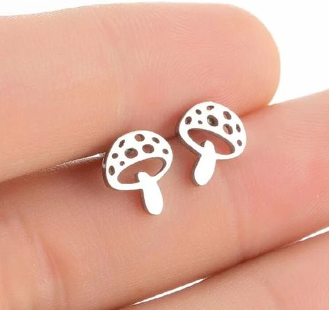 Cute Toadstool Stainless Steel Earrings - Silver Tone Earring size: 11mm x 9mm Material: Stainless Steel Colour: Silver Shipping and Delivery: This item will be dispatched in 1-2 business days via: UK - 1st class post International - International Tracked and Signed Thanks so much for taking a look at my shop! Studded Accessories, Tiny Mushroom, Jewelry Ear, Mushroom Earrings, Ear Earrings, Tiny Earrings, Ear Stud, Earrings Studs, Stud Earrings Set