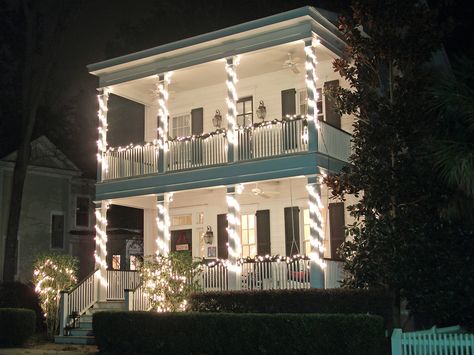 lighted columns and garland Column Christmas Lights, Christmas Lights On Columns, Charleston Christmas, Inspectah Deck, Christmas In, House Lights, Outside Christmas Decorations, Cozy Cottages, Christmas House Lights