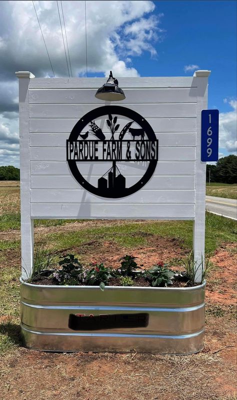 Feed Trough Planter Ideas, Outdoor Sign Ideas For Business, Lighted Business Signs Outdoor, Outdoor Business Signs Ideas, Watering Trough Planter, Farmhouse Front Yard Ideas, Wooden Farm Signs Entrance, Metal Yard Signs Outdoor, Wooden Business Signs Outdoor