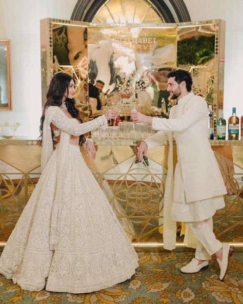 Alanna Panday on Instagram: “Cheers to a new chapter 🥂 Celebration Partner @johnniewalkerindia @jwgoldlabel” Couple Wedding Dress Indian Matching, Bride And Groom Indian Wedding Outfit, White Wedding Lehenga, Groom Indian Wedding Outfits, White Bridal Lehenga, Alanna Panday, Indian Wedding Reception Outfits, Wedding Outfits Indian, Bride And Groom Outfits