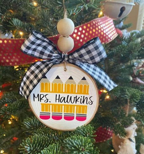 Teacher Gift | Teacher Appreciation | Christmas Gift 3.5"-4.5" Wood Slice Ornament with bead and ribbon bow. Comes with (1) side finished.  Add the back side with student's name and year for an upcharge Bulk Discount available with the purchase of 3 or more.  Use code ORNAMENT20 at checkout. Shipping discount with local KC pickup. Contact me for discount code.