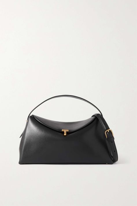 Chic black handbag inspiration. Simple accessories inspiration. TOTEME T-Lock leather shoulder bag from NET-A-PORTER. How to choose an everyday handbag. Luxury handbag inspiration. #theannaedit #totemebag #handbagwishlist Black Handbag, Jo Malone London, Designer Shoulder Bags, Ski Wear, Mr Porter, Who What Wear, Leather Handbag, Net A Porter, Hobo Bag