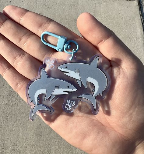 "Carry around your favorite sea animal in keychain form! Featuring Great White Sharks! This acrylic keychain is 2.5\" in size, excluding the clasp, and has a transparent blue tint on the acrylic to resemble water!  Feel free to message me if you have any questions!" Shark Merch, Shark Products, Shark Themed Items, Shark Items, Shark Things, Shark Keychain, Orca Keychain, Pikachu Funny, Shark Room