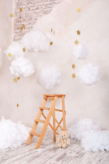 Photo wooden staircase stool with clouds... | Premium Photo #Freepik #photo #wood-furniture #stool #wooden-chair #wood-interior Hot Air Balloon Backdrop, Studio Background Ideas, Background Moon, Christmas Tree Festival, Studio Photography Backdrop, Baby Photography Backdrop, Care Bear Party, Wooden Staircase, Baby Backdrop