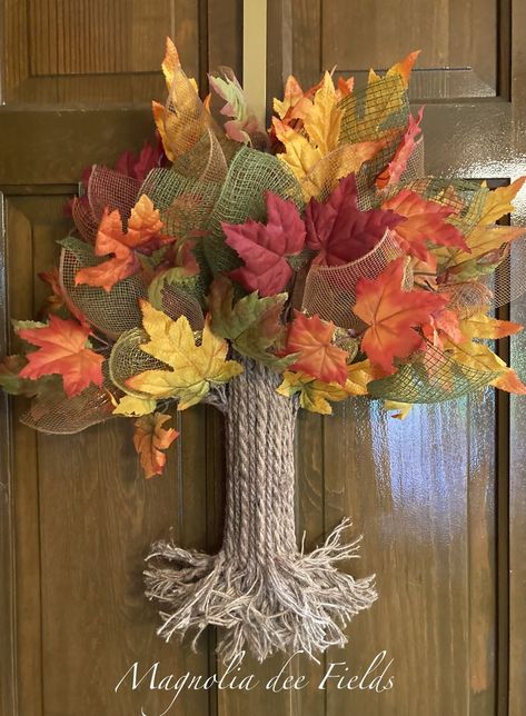 Tree of Life Autumn Wreath with sun kissed leaves. Combining my love of genealogy and wreath making. An original Magnolia dee Fields design; unique concept & custom designed frame. Gorgeous tree with multicolor leaves depicting the wonders of autumn. A layered treetop with rich hues of orange, red, yellow, and green with a hint os shimmer on some leaves. Finished fabric backing. Jute hanger. Measures Approximately 26"H x 22"W. Autumn Front Porch Decor, Autumn Front Porch, Fall Decor Wreaths, Fall Pumpkin Crafts, Fall Decor Diy Crafts, Fall Decor Dollar Tree, Fall Deco, Fall Thanksgiving Decor, Dollar Tree Diy Crafts