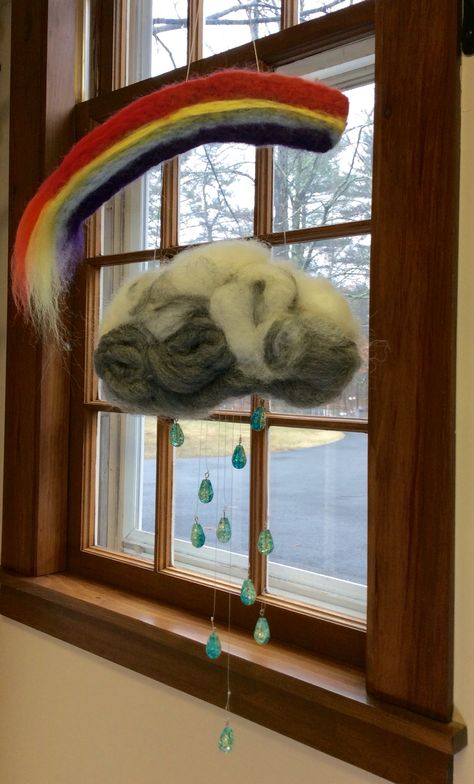 Needle felted mobile from merino wool and glass crystal raindrops. First of a kind. Felted Mobile, Cloud And Rainbow, April Crafts, Felt Mobile, Rain Cloud, Wet Felt, Needle Felting Projects, Small Studio, Felted Wool