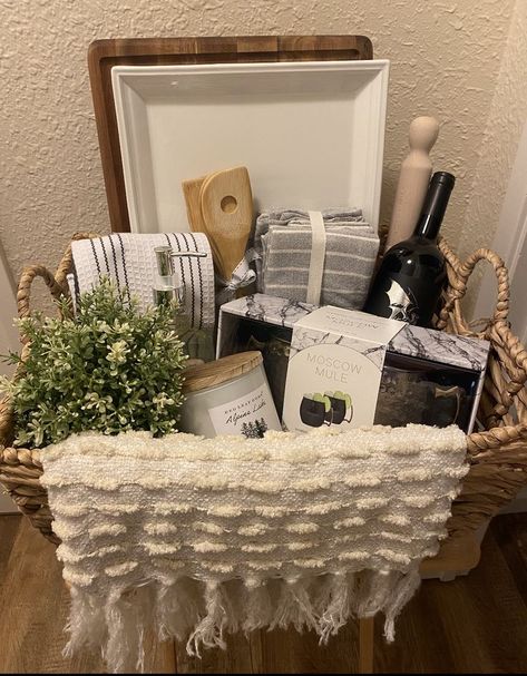 Beautiful way to gift some fun "essentials" Wedding Wine Basket, Bridal Shower Kitchen Gifts, Wedding Shower Gifts Basket, Bridal Shower Gift Basket, Friendship Gifts Diy, Bridal Gift Baskets, Bridal Shower Baskets, Auction Gift Basket Ideas, Diy Bridal Shower Gifts