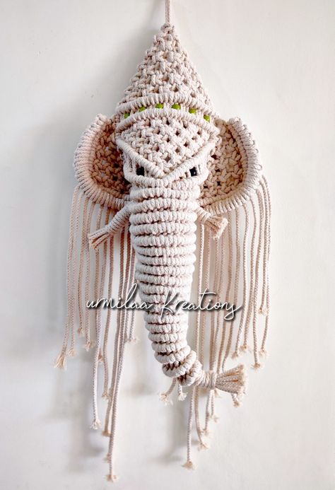 This dainty and light macrame wall hanging is made with natural high quality strands of cotton rope. Simple yet meticulously handcrafted, sturdy and durable. They are naturally beautiful and safe,the structure is compact and orderly. Perfect for adding just the right touch to the boring wall brightening any room
Create a modern, tasteful looking home using Wall Hanging in your home. Elephant Macrame, Flowers Craft, Paper Flowers Craft, Cotton Rope, Flower Crafts, Paper Flowers, Dream Catcher, Macrame, Knot