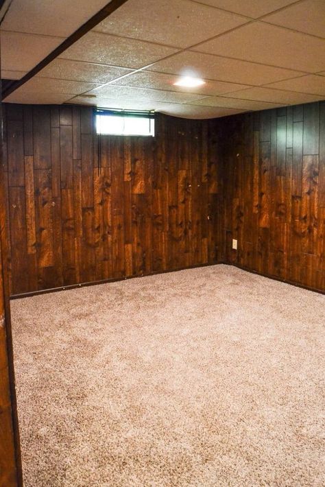 When we bought our first flip house , we were dreading the ugly paneling that covered almost every wall in the basement. We put that project in the back or our minds as we tackled other projects in the house. I really wanted to transform the family room in the basement because it was such a great asset to the house.  the paneling made it so dark and depressing that no one would really want to spend much time down there. We had to change it. Before we closed on the house, we went back a… Basement Faux Fireplace, Paneling Walls Makeover, Painting Paneling Walls, Cheap Paneling, Painting Over Paneling, Cover Wood Paneling, Wall Paneling Makeover, Wood Paneling Makeover, Paneling Makeover