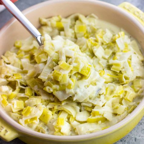 Creamed Leeks - My Sequined Life Creamed Leeks Recipes, Leeks In White Sauce, Leeks Side Dish, Creamy Leeks, Winter Sides, Holiday Dinner Sides, Leek Salad, Braised Leeks, Leek Recipes