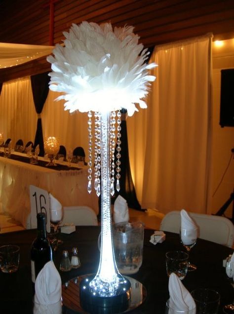 Tips for Using Eiffel Tower Vases for Wedding Centerpieces Photo Elegant Wedding Ideas, Eiffel Tower Vases, Tower Vase, Crystal Garland, Feather Centerpieces, Event Centerpiece, Flower Centerpiece, Elegant Centerpieces, Hanging Crystals