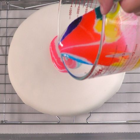 Here's a Colorful Way to Decorate a Cake | TipHero Runny Icing For Cake, Tie Dye Fondant Cake, Hippie Cake, Poured Icing, Glaze Icing, Decorate A Cake, Rainbow Treats, Mirror Glaze Cake, Mirror Glaze