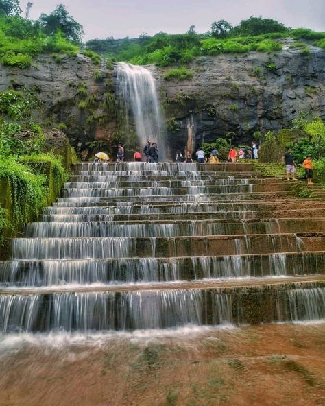 Waterfall with an infinity pool - Kanhe waterfall. Click 'More' to known more. . . ======================== Photo credit: @shivkumar07 ======================== . . Kanhe waterfall, also known as Khandi waterfall and Jagtap waterfall is a small waterfall near Pune. It is a seasonal waterfall that attracts multiple tourists due to its ease of access, man-made pool, and flight of stairs from where water runs below.  This waterfall is maintained by a family and they charge a fee of Rs. 100 to visit Lonavala Waterfall, Lonavala Photography, Maharashtra Travel, Waterfall Resort, Land Scapes, Small Waterfall, Vacation Places, Infinity Pool, India Travel