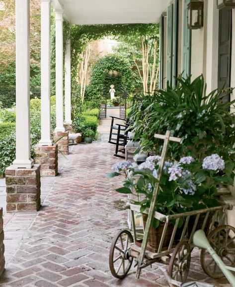 Welcome To Charleston| Charleston Magazine | Charleston, SC Brick Courtyard, Brick Porch, Charleston Gardens, French Country Front Porch, Brick Columns, Courtyard Gardens, Pathway Landscaping, Porch Columns, Charleston Homes