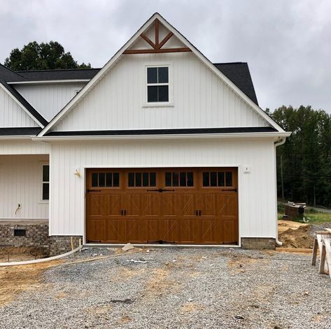 Garage Door Photos – Inspiration Image Gallery | Amarr® Oak Garage Doors, Brown Garage Door, Cedar Garage Door, Garage Door House, Wooden Garage Doors, Farmhouse Garage, Modern Garage Doors, White Siding, Carriage Doors