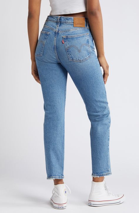 Inspired by cheeky vintage Levi's styles, these low-stretch jeans in a sanded medium wash hug the hips to showcase your curves to greatest effect. Distressed hems add lived-in character to the casual look. 15" leg opening; 11" front rise; 14 1/2" back rise (size 29 x 28) Button fly 99% cotton, 1% elastane Machine wash, tumble dry Imported Womens Jeans 2024, Levi High Waisted Jeans, Midsize Jeans, Levi Wedgie Jeans, Levi Jeans Outfit, Levi Wedgie Straight Jeans, Weekend Outfit Ideas, Levis High Waisted Jeans, Womens Levi Jeans