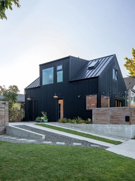 Low maintenance exterior design on Vancouver Island. Small Black Modern House, Steel Siding House, Workshop Apartment, Front Doors Colors, Black Barn House, Black Metal House, Country Farmhouse Exterior, Doors Colors, Timber Frame Cabin