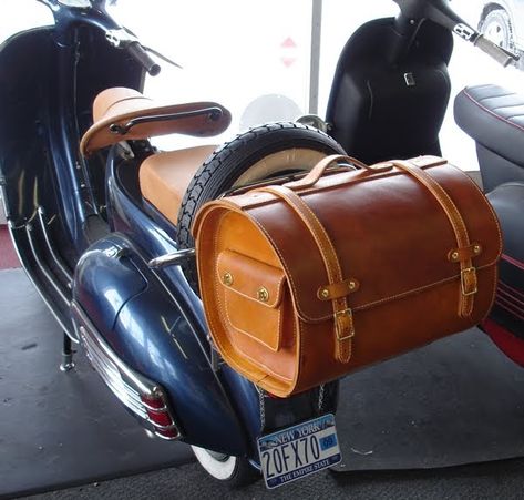 I  think that up next on our scooter accessory list will be this leather top case .  Isn't it just extraordinary!  It is equal parts hip and... Vespa Accessories, Steampunk Motorcycle, Classic Vespa, Retro Scooter, Handmade Leather Backpack, Vespa Vintage, Motorcycle Leather, Monogrammed Leather, Leather Projects