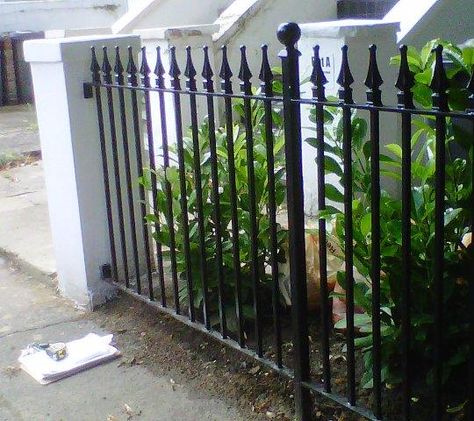 Rod Iron Fences, Iron Railings Outdoor, Wooden Fireplace Surround, Outdoor Garden Bar, Wrought Iron Railings, Garden Railings, Gates And Railings, Iron Railings, Balcony Grill Design