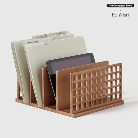 Keep your files, folders, manuals, notebooks and mail neatly sorted and effortlessly accessible with this handy desktop collator. It's also great for organizing tech devices. Part of our exclusive collection of sustainable products designed by Marie Kondo, this file organizer is handmade from bamboo, an easily renewable resource, and was inspired by the traditional Japanese shoji screens. Japanese Organization, Shop Shelf, Art Fair Display, Japanese Desk, Desk File Organizer, Shoji Screens, Desk File, File Folder Organization, File Boxes