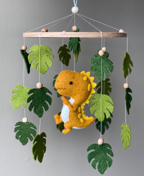 Baby Mobile Arm, Diy Baby Mobile, Baby Boy Mobile, Felt Toys Patterns, Baby Toys Diy, Dinosaur Crafts, Wooden Hanger, T Rex Dinosaur, Diy Embroidery Patterns