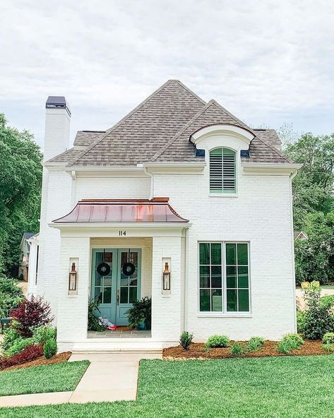 Quaint Homes, Cottage Home Exterior, Bold Front Door Colors, White Brick House, Modern Tudor, Cottage Vibes, Double Closet, Cottage Style Home, Copper Roof