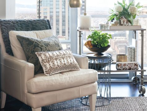 Downtown's Most Beautiful Condo - 5280 High Rise Apartment Decor, Beautiful Condo, Grey Duvet, High Rise Apartments, Focal Wall, Wedding Blankets, Orange Pillows, Ikat Pillows, Tufted Headboard