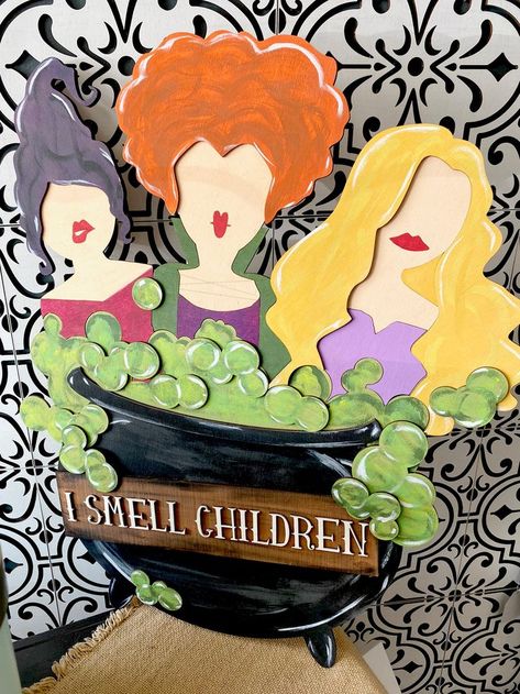 Dive into Hocus Pocus-themed decorations perfect for school or home, including door hangers and DIY projects that celebrate the magic of the Sanderson sisters! Hocus Pocus Headstones, Hocus Pocus Window Display, Hocus Pocus Door Decorations, Hocus Pocus Door Decorations For School, Hocus Pocus Classroom Door, Hocus Pocus Door Decor, Hocus Pocus Decor Diy, Hocus Pocus Bulletin Board, Hocus Pocus Decorations Diy