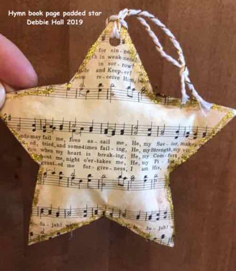 Padded Hymnal Page Star Ornament. Debbie Hall 2019 Hymnal Page Ornaments, Hymnal Page Christmas Ornaments, Old Hymnal Crafts, Hymnal Ornaments, Hymnal Page Crafts, Hymnal Crafts, Sheet Music Crafts, Christmas Craft Show, Old Book Crafts