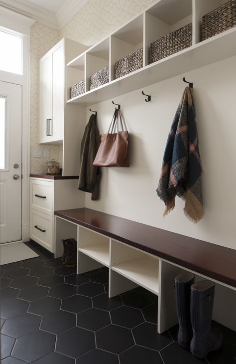 Custom mudroom cabinetry with Farrow & Ball Aranami wallpaper and black hexagon tile floor. Black Hexagon Tile Floor, Entryway Tile Floor, House Mudroom, Mudroom Cabinetry, Dark Tile Floors, Custom Mudroom, Room Tiles Floor, Transitional Entry, Black Hexagon Tile