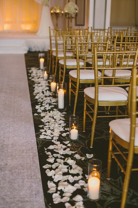 Photography: Paige Jones - paigejones.co  Read More: http://www.stylemepretty.com/2014/11/10/sophisticated-atlanta-wedding-at-the-georgian-terrace-hotel/ Wedding Aisle Candles, Aisle Candles, Rose Petal Aisle, Flower Petals Wedding, Rose Petals Wedding, Silk Rose Petals, Pew Ends, Wedding Isles, Aisle Runner Wedding