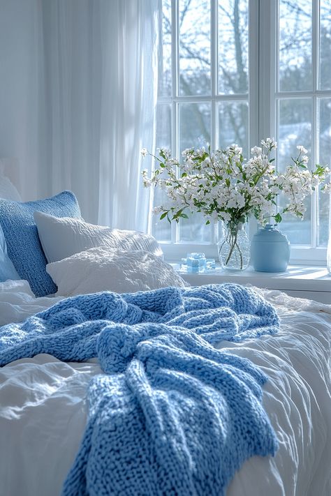 Find your perfect white and blue bedroom aesthetic with 27 inspiring ideas. Explore a range of styles, from coastal chic to modern minimalism.  Discover white and blue bedroom ideas featuring crisp white bedding, soft blue walls, and stylish white furniture with blue details. Incorporate striped throw pillows, ocean-themed artwork, and blue and white patterned curtains for a truly unique white and blue bedroom decor.  Find inspiration for a tranquil and refreshing bedroom retreat. Blue Sheets Aesthetic, Blue Aesthetic Bed, Blue Room Inspo Aesthetic, White Blue Bedroom Ideas, Blue And Gold Bedroom Decor, Blue Room Decor Bedroom, Blue Theme Aesthetic, White And Blue Bedroom Ideas, Purple And Blue Room