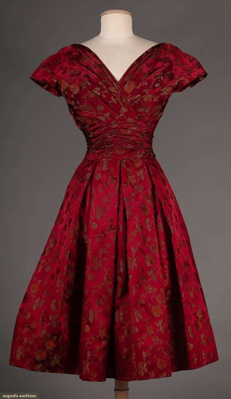 GATTINONI RED BROCADE PARTY DRESS, ROME, 1950s   Up for Auction October 24, 2018 160 Central Park West, Ny, Ny Blood red silk satin w/ small rose brocade in red & silver, low V necklines, cap sleeves, inset midriff band, box pleated full skirt, black mesh boned corset w/ attached black petticoat, label "Gattinoni Roma", B 36", W 23", L 45", excellent 1950s Clothes, Slavic Style, 1950s Dresses, Vintage Red Dress, Vintage Fashion 1950s, Fashion 1950s, Full Skirts, Small Rose, 50s Dresses