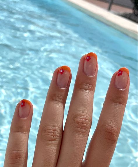 Tropical nails orange french tip nails with flower detail design #orangenails #frenchtipnails #orangenails #flowernails #flowernailart #pinterestnails #nailinspo #nailaesthetic #pinterestinspired #tropicalnails #springbreaknails #spring #summernails #summer Fun French Tips, Orange French Tip, Natural Nail Shapes, Spring Break Nails, Beachy Nails, Funky Nail Art, Tropical Nails, Pretty Nail Colors, Vintage Nails