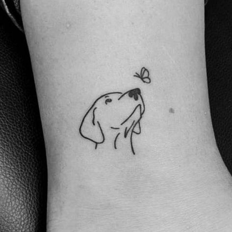 Dog Tattoo With Butterfly, Dog Tattoos Labrador, Line Tattoo Of Dog, Simple Rottweiler Tattoo, Dog Face Tattoo Simple, Dog With Butterfly Tattoo, Lab Dog Tattoo Ideas, Butterfly And Dog Tattoo, Labrador Line Tattoo